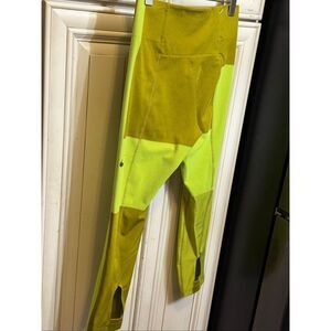 Nike Women's High Waisted Tech Pack Cropped Tights Moss Volt Green Medium